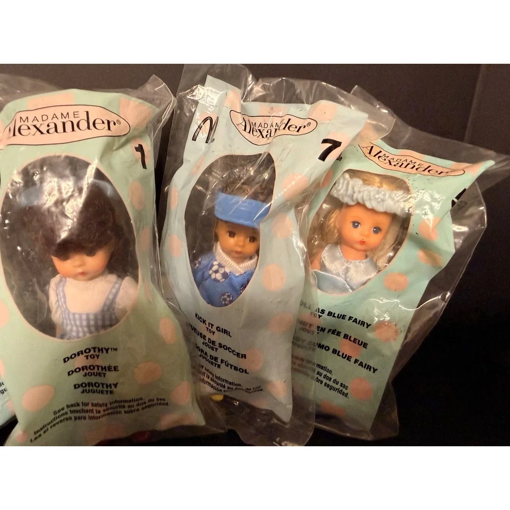 Lot of 8 Madame Alexander McDonalds Happy Meal Dolls Dorothy Mickey Cruella, etc